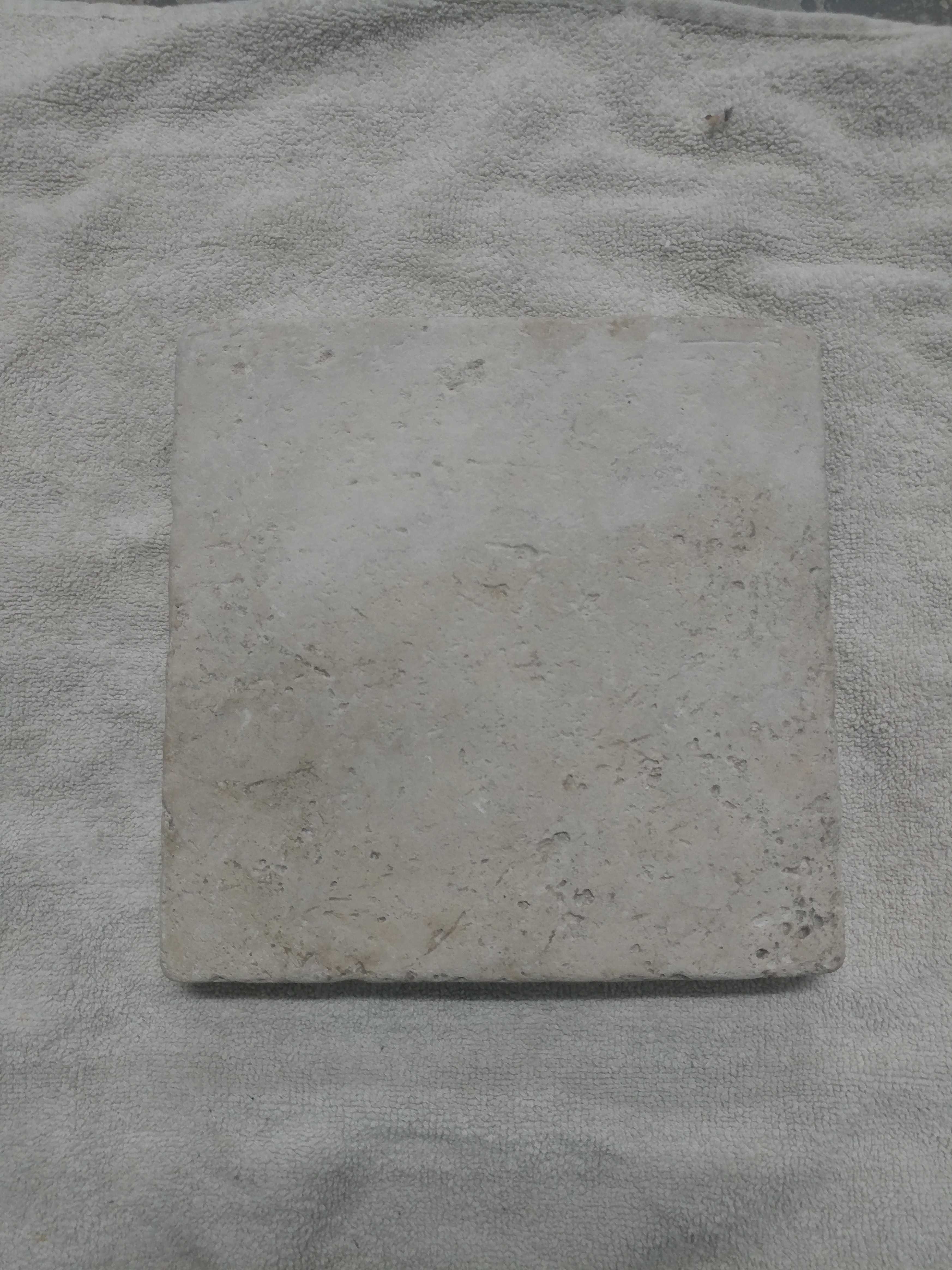Dull Limestone Tile Before Color Sealing Application